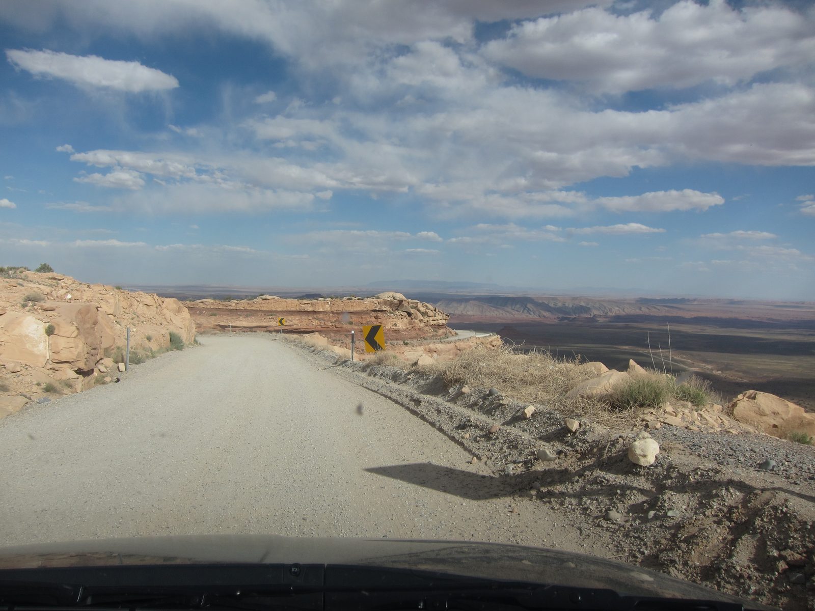 The beginning of the Moki Dugway .... it drops off a plateau into the valley visible below.  It...